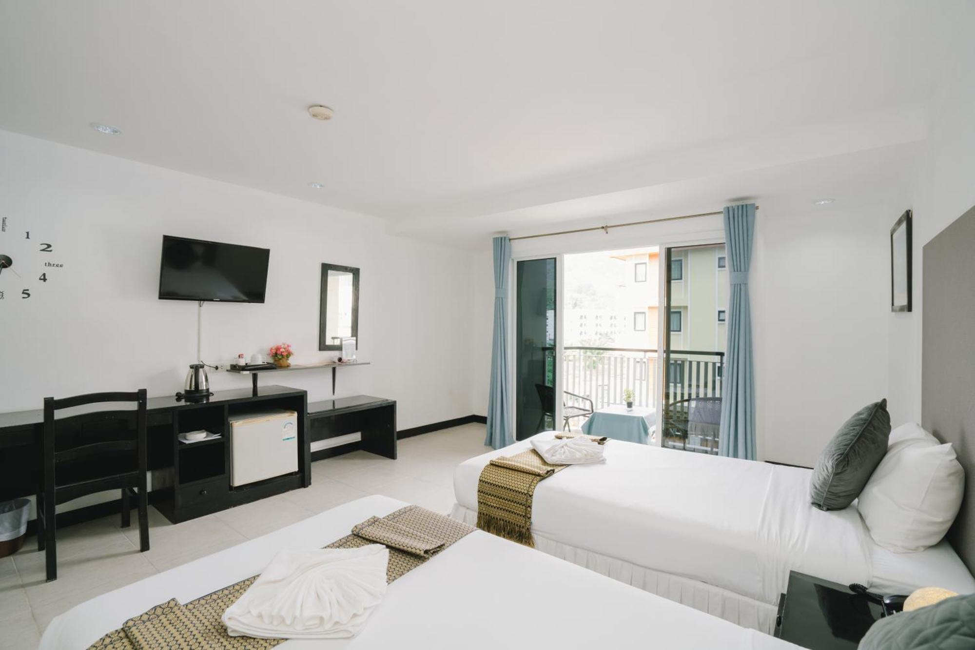 Noble House Patong Hotel Exterior foto