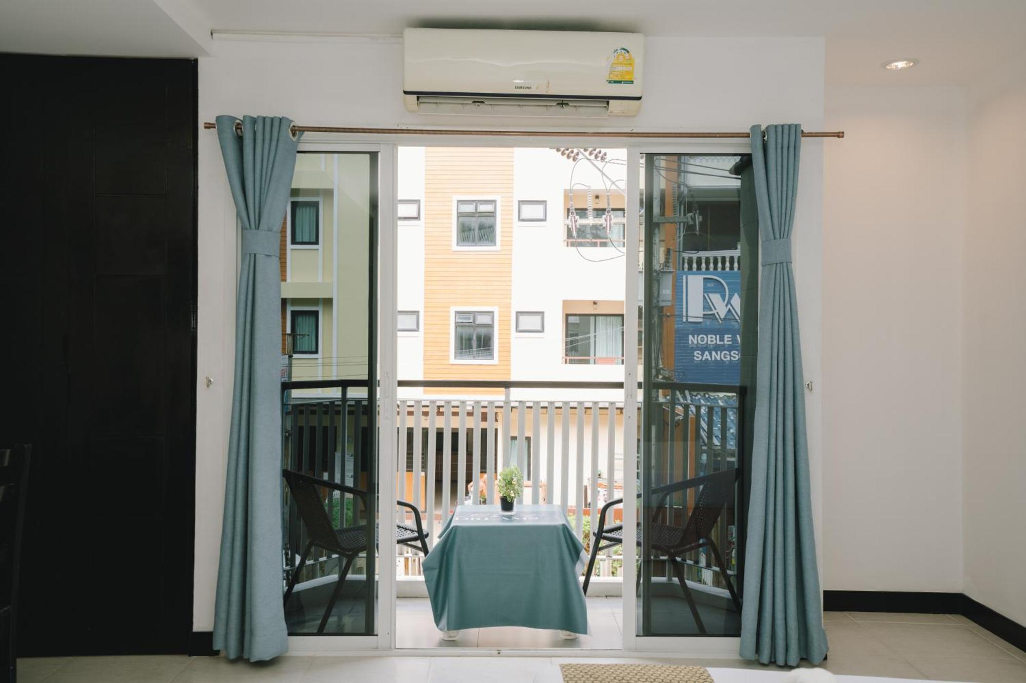 Noble House Patong Hotel Exterior foto