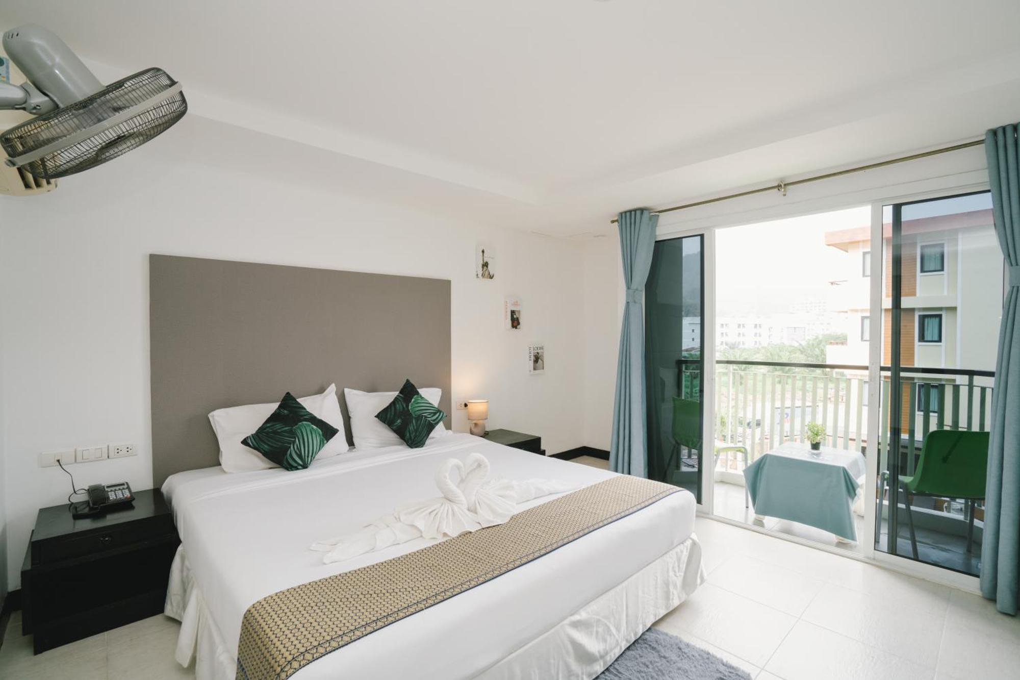 Noble House Patong Hotel Exterior foto